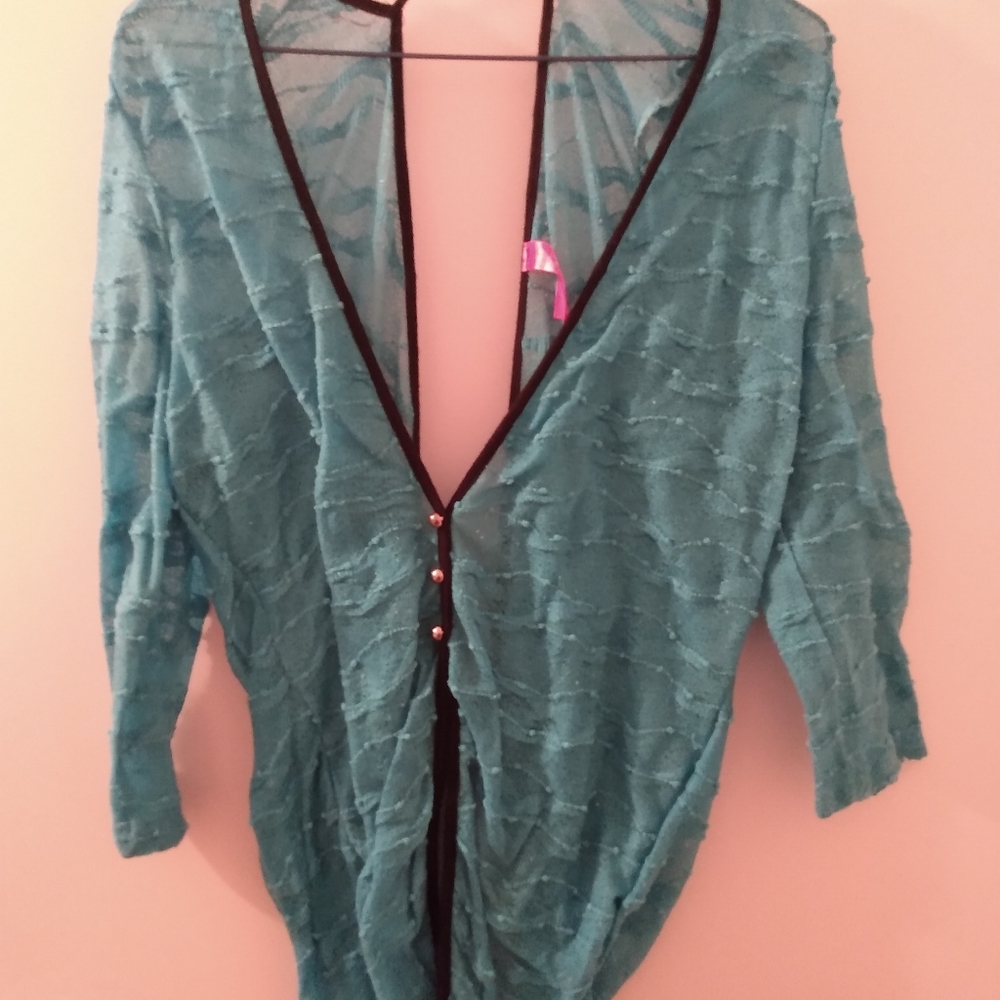 Blue 100% polyester top with black trim